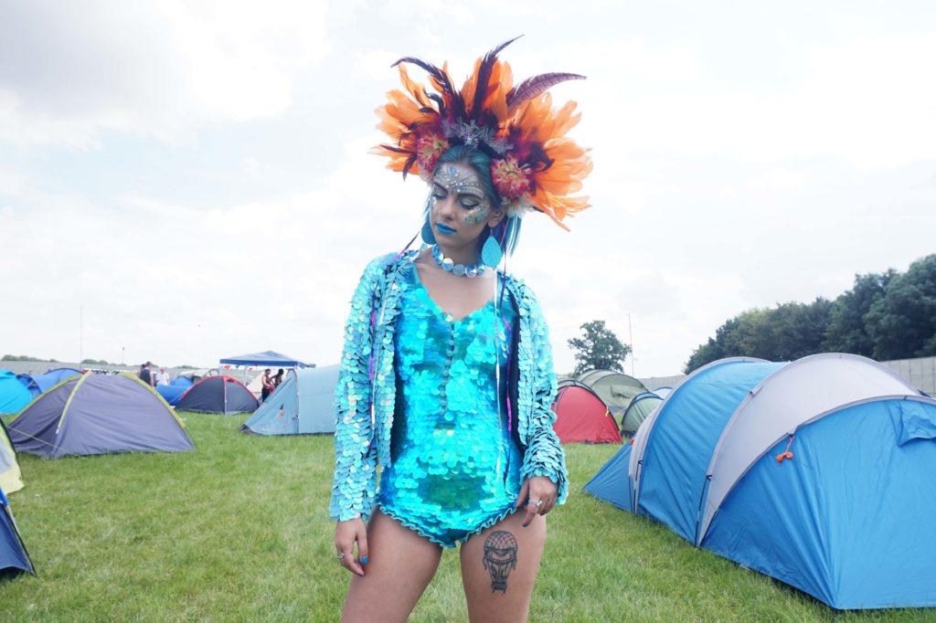 sophie hannah richardson at secret garden party wearing a sequin playsuit