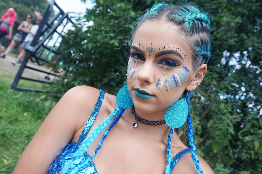 Sophie Hannah Richardson with blue festival makeup