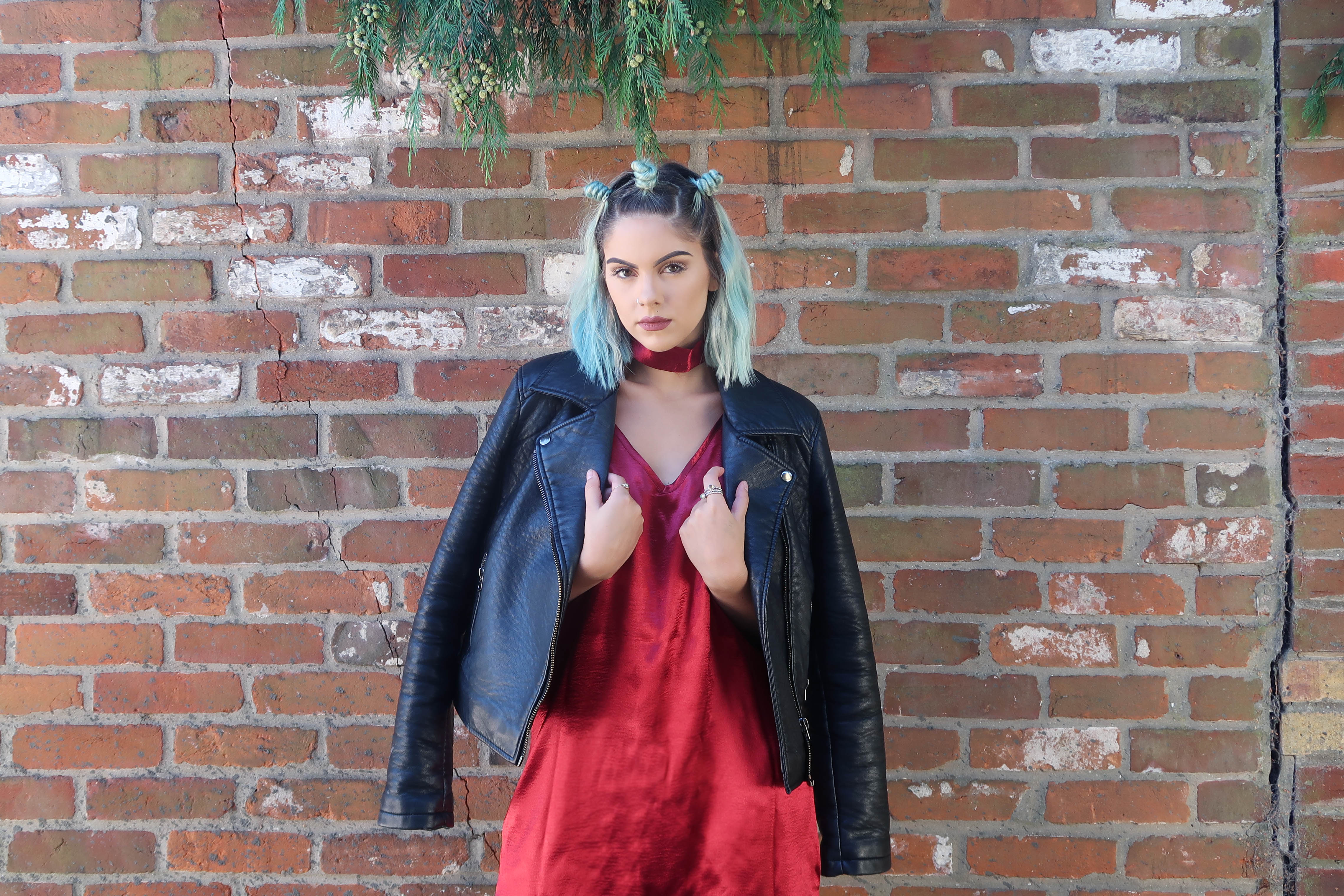 sophie hannah richardson wearing a silk red dress from boohoo