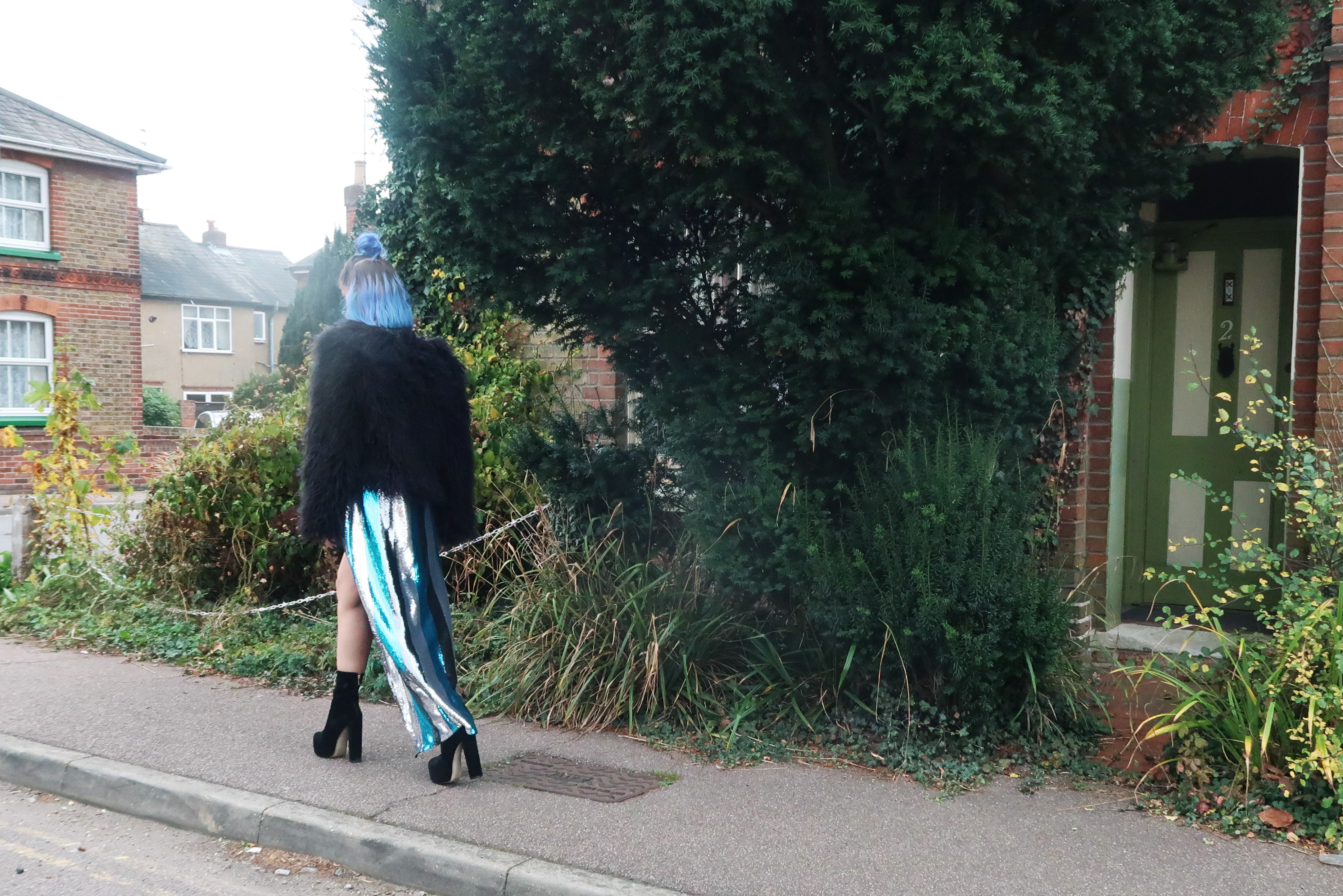 sophie hannah richardson wearing a sequin dress and fur coat