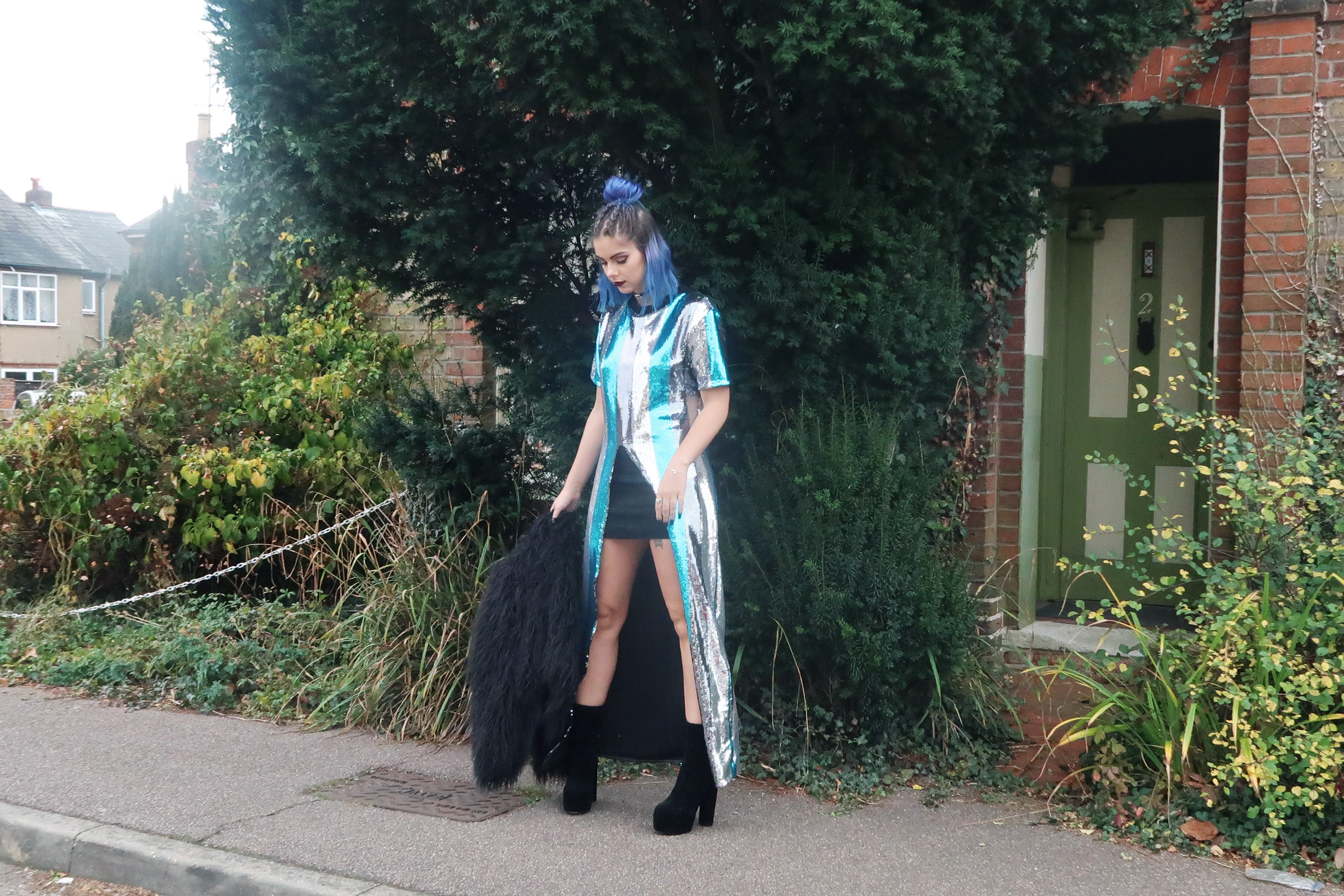 sophie hannah richardson wearing a sequin dress and fur coat