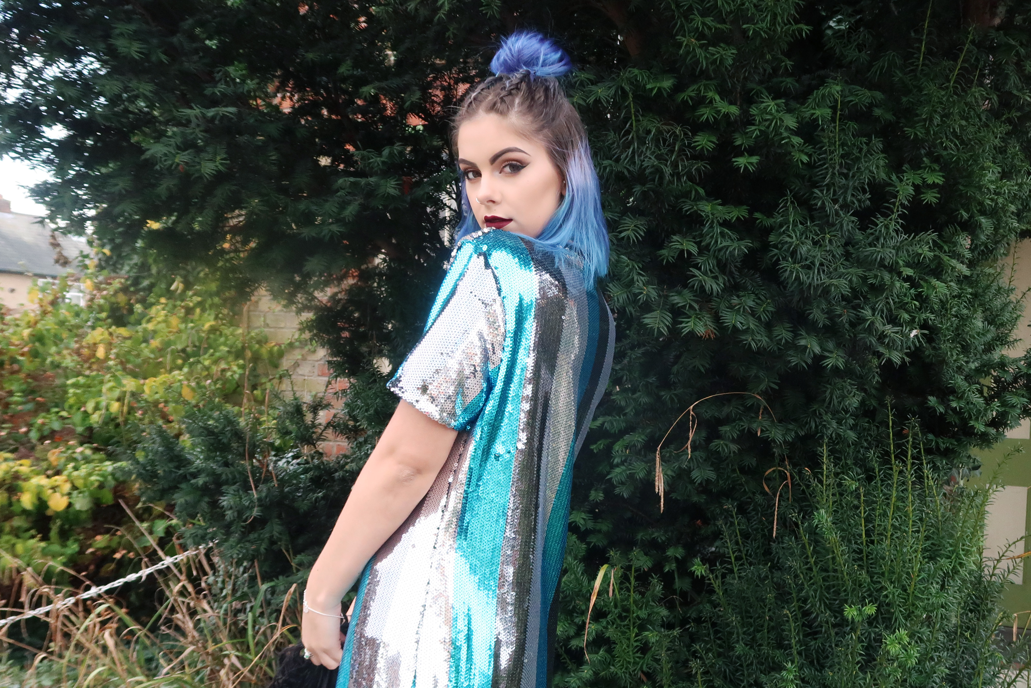 sophie hannah richardson wearing a sequin dress and fur coat