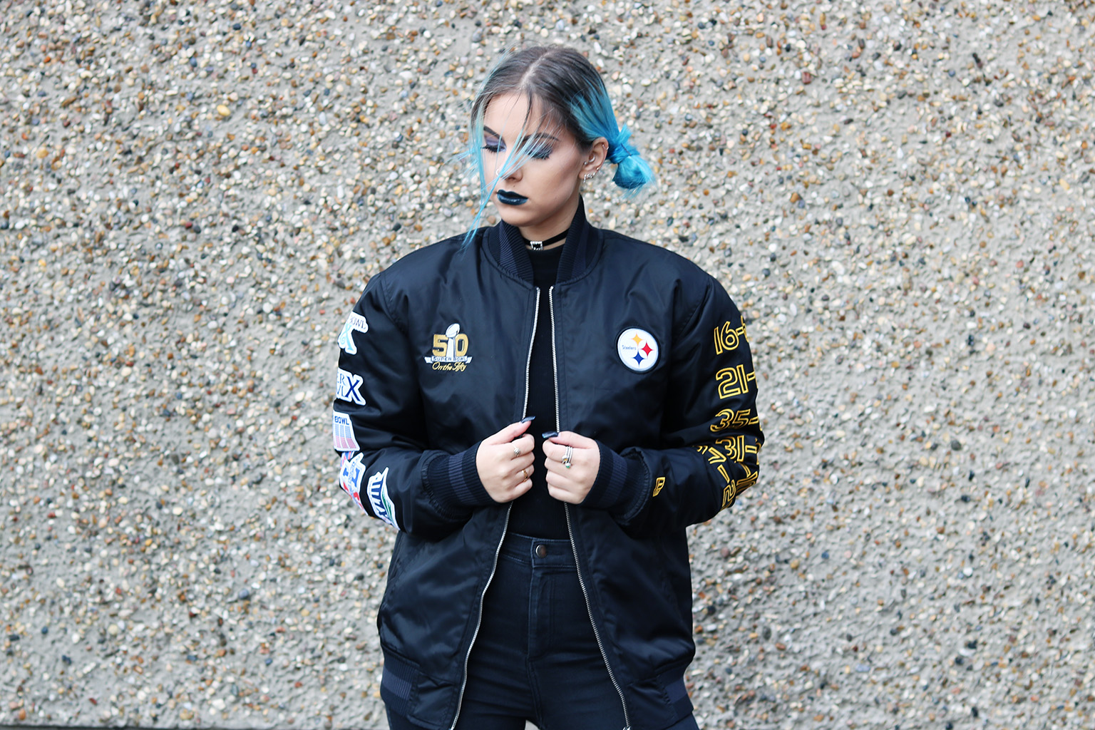 sophie hannah richardson wearing a bomber jacket from New Era