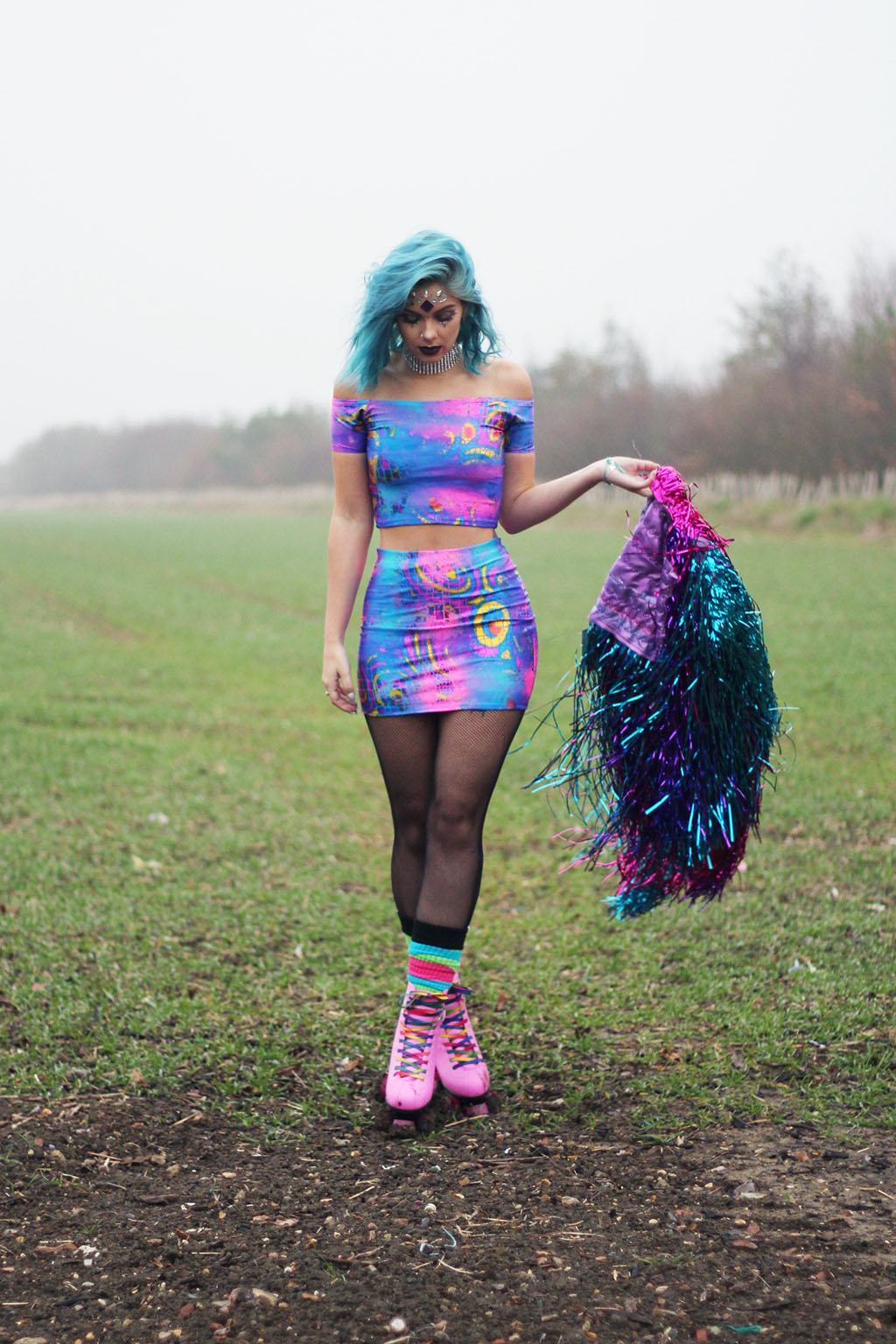 sophie hannah richardson with a smoke grenade celebrating new year goals